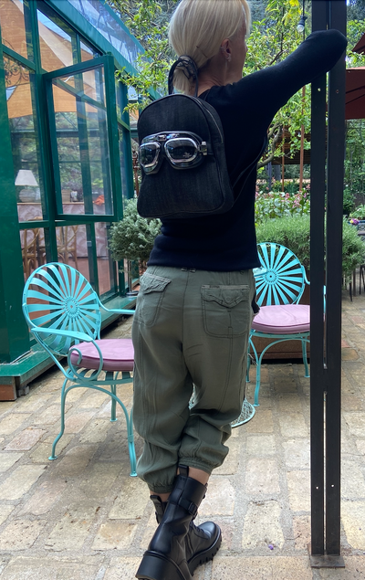 Small denim backpack with glasses